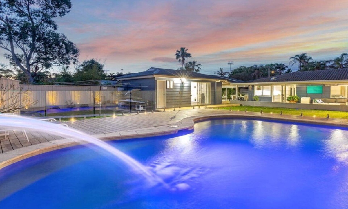 Berkeley Vale House | Poolside Family Retreat by HolidayCo.