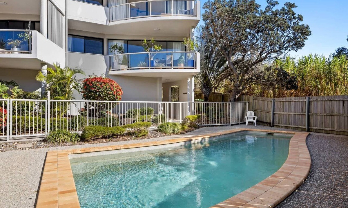 Sunrise Beach Apartment | Pristine 2-Bed Apartment with Pool and Balcony