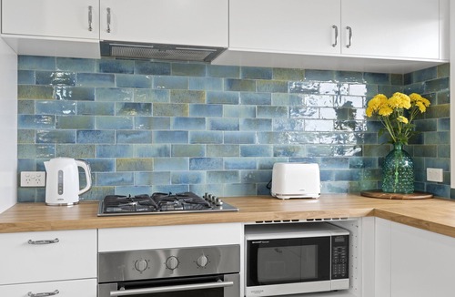 Tweed Heads Apartment | Canal living with private beach, boat ramp, pontoon, fishing and kayaks.