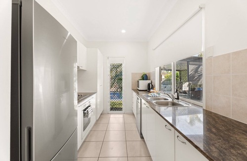 Toogoom Apartment | Coastal 4-Bed Retreat with Pool in Toogoom