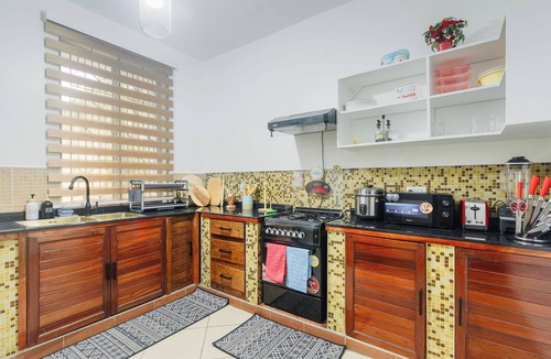 Mwananyamala Apartment | Cozy 2BR All Ensuite, Fast Wi-Fi, Backup Power, Workspace, Secure Gated Estate