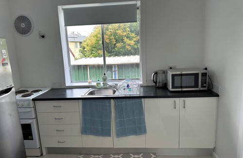 Busby Apartment | Cozy and private one bedroom studio with double bed for couples or single