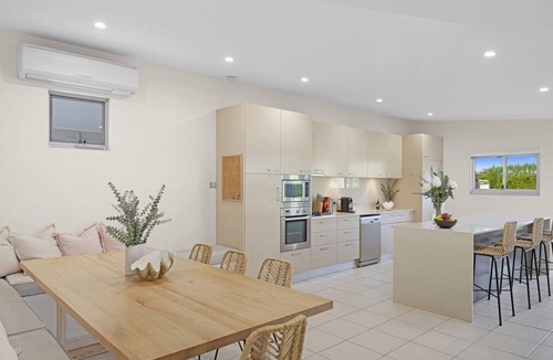 Bateau Bay House | Heated swimming pool and walk to beach
