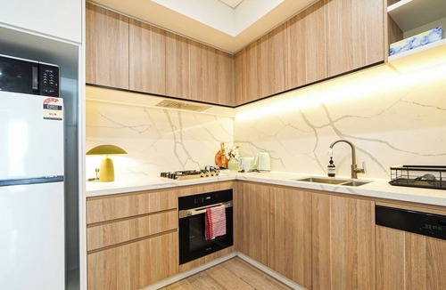 Burwood Apartment | KozyGuru | Burwood | Harbour Bridge-View Apt