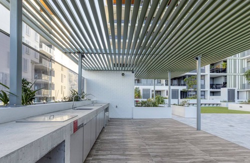 Bokarina Apartment | Lush Beachfront Living with Parking, Pool and BBQ