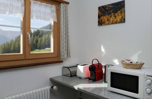 Frauenkirch Apartment | Nice apartment for 3 guests with WIFI, TV, terrace and panoramic view