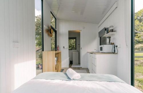 Kuranda House | Rainforest Sunsets by Tiny Away