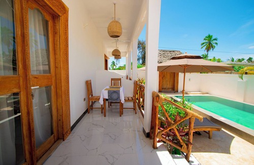 Kiwengwa House | Villa with two double master suites, a private pool, and an exclusive beach area