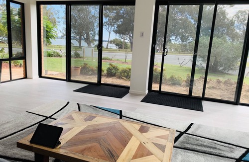 Banksia Beach House | Water front Property with magical sunsets and water front walking and bike paths