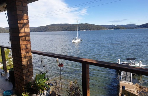 Little Wobby House | Waterfront with private jetty and sunset views. Boat access only. Pet friendly.