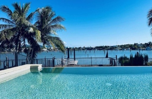 Cardwell House | Welcome to 'Hinchinbrook Escape' Waterfront Townhouse with Marina Berth Pool Spa