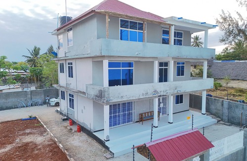 Uroa Apartment | Zanzibar Bliss – Uroa Beachfront 2BR Retreat with Balcony & WiFi