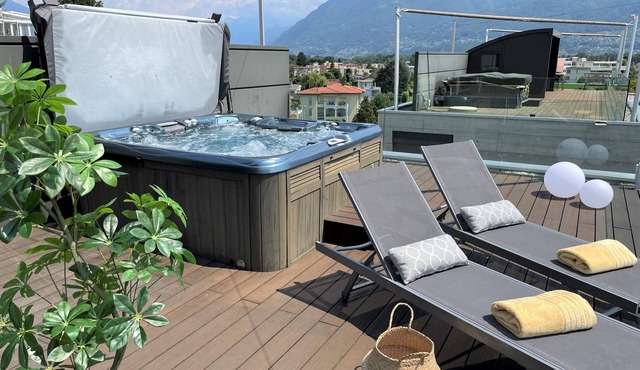 Air-conditioned attic apartment with large private terrace and whirlpool in Ascona