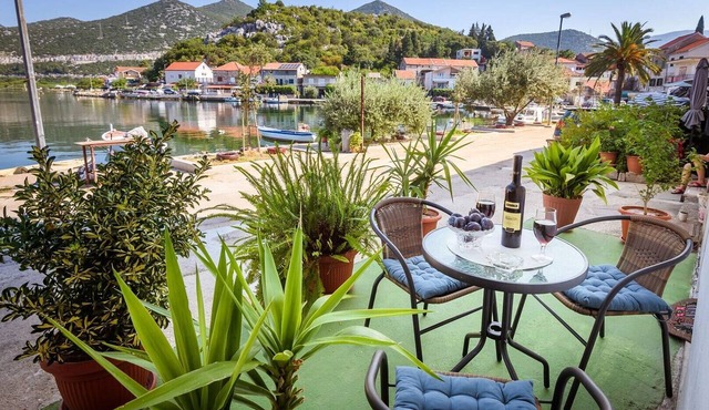 Apartment Đego near Ploče, riverfront, parking