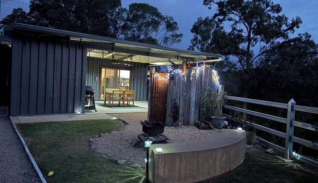 Hayden's Place is a cozy tiny off‑grid home offering stunning 180° views.