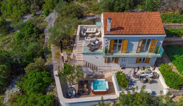 Uniquely designed Villa Ivana with outdoor Jacuzzi nearby the pebble Banje beach at the Island of Solta in Rogač