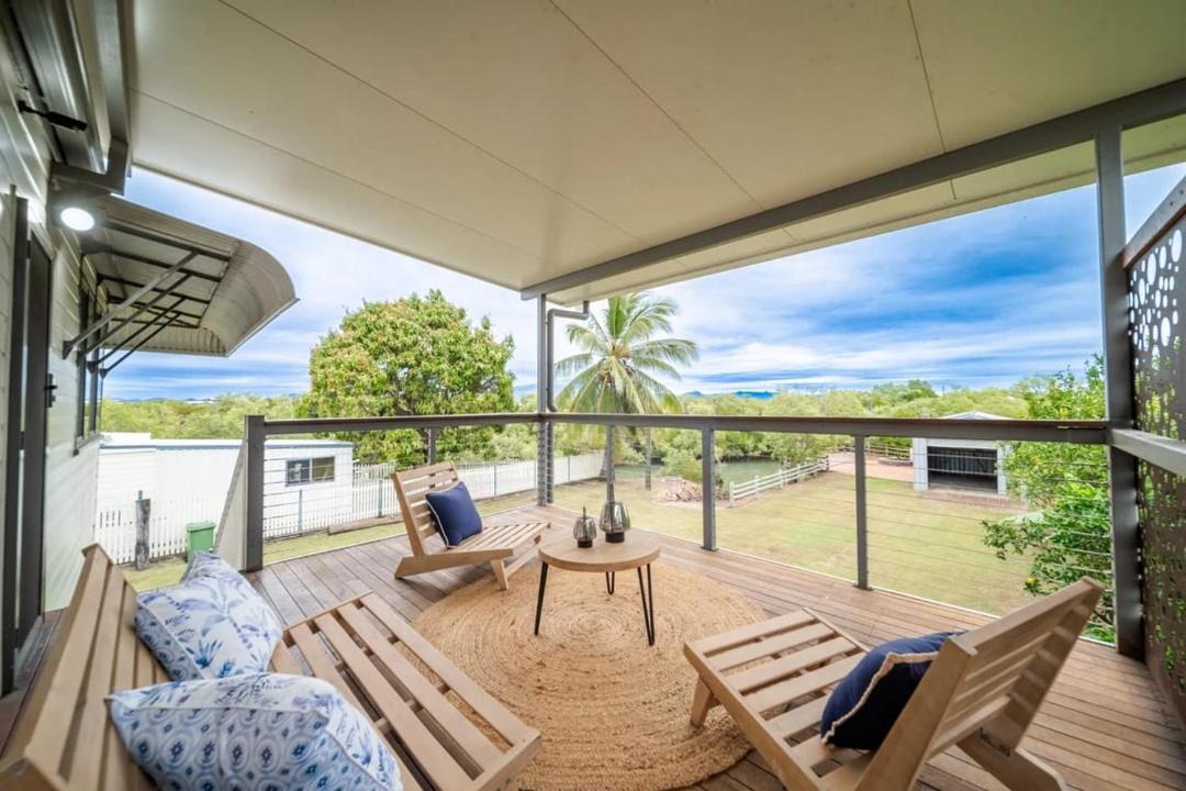 South Townsville House | Riverfront Retreat - Fish from Deck with Boat Ramp