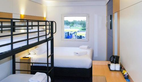 Standard Family Room with One Queen and Double Deck Bunk Beds