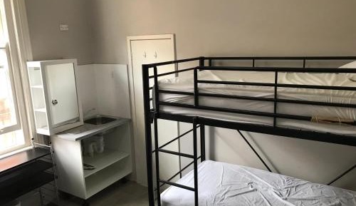 Bed in Mixed 5-Bed Dormitory Room with Private Bathroom