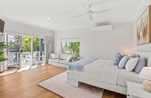 Banksia Beach House | Bribie Waterfront Retreat - Pontoon Pool & Kayaks