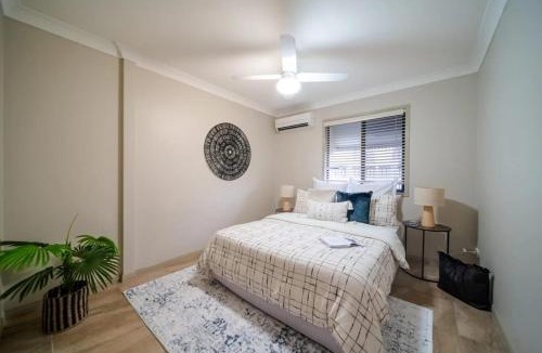 South Townsville House | Riverfront Retreat - Fish from Deck with Boat Ramp